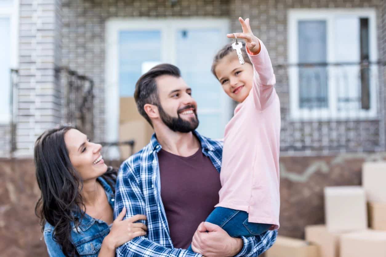 A family spending time together on their front porch.