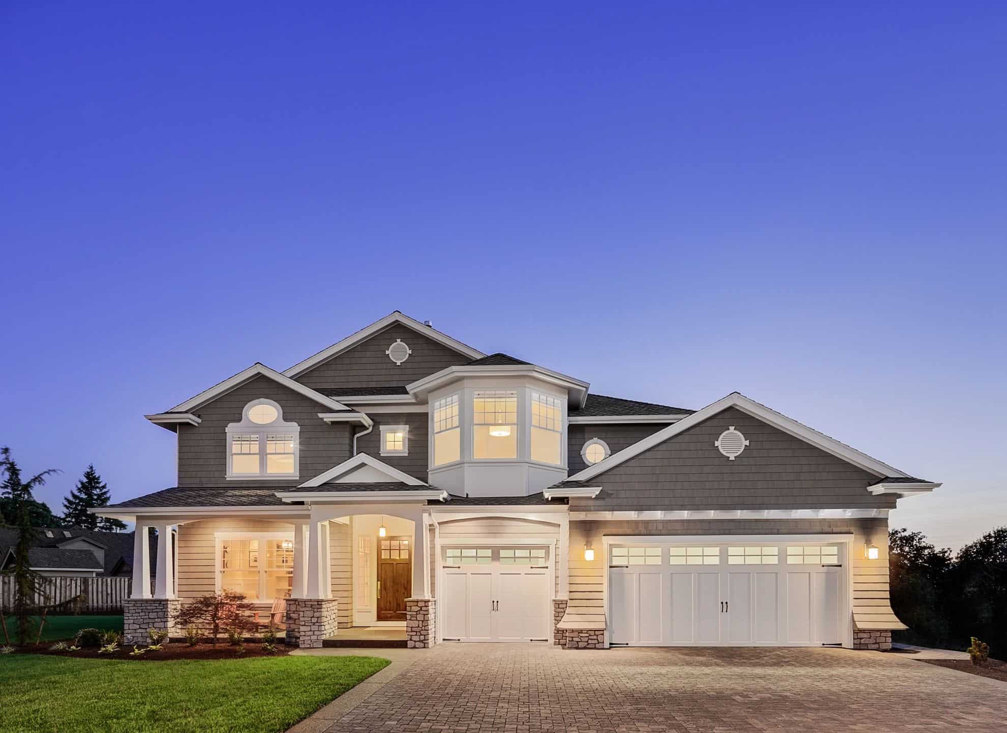 Two-story home at dusk.