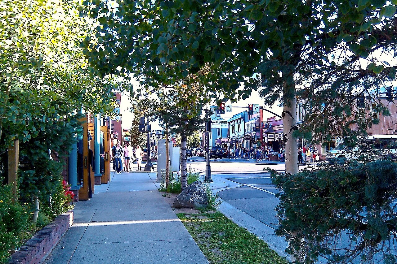 Storefronts and trees along Main Street in Breckenridge, Colorado.