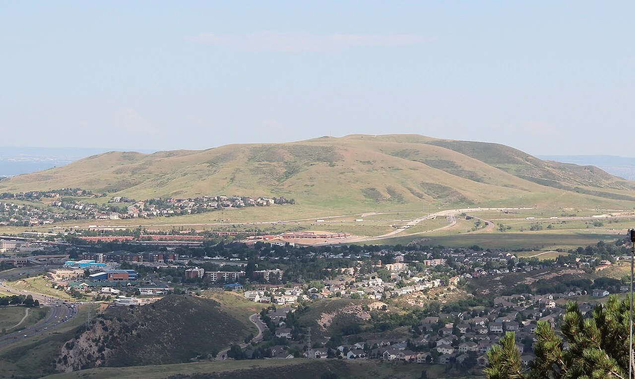 Green Mountain's grassy hills above residential neighborhoods in Lakewood, Colorado.