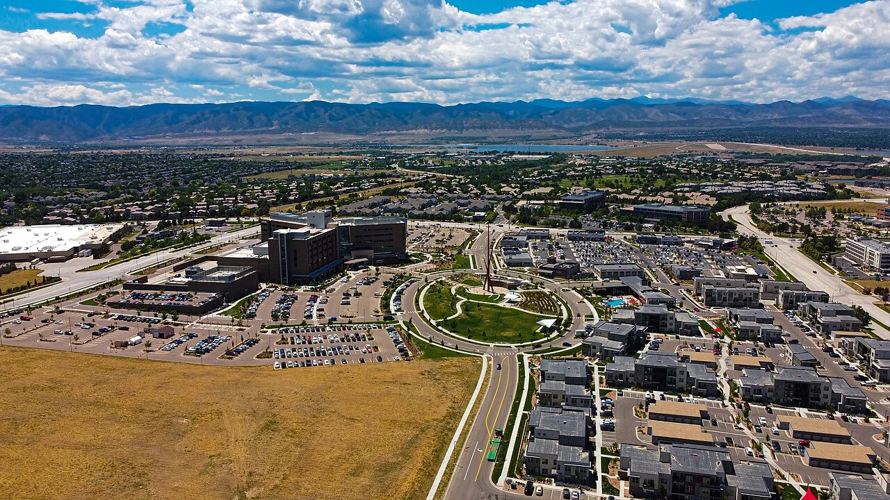Aerial view of homes, streets and open space in Highlands Ranch, Colorado.