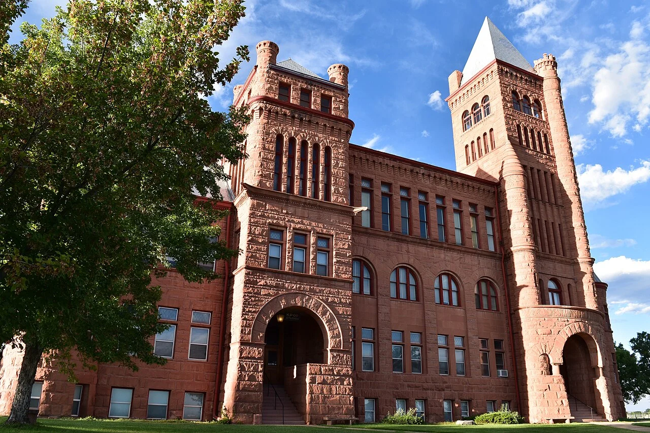 The red-brick historic Westminster University building in Westminster, Colorado.