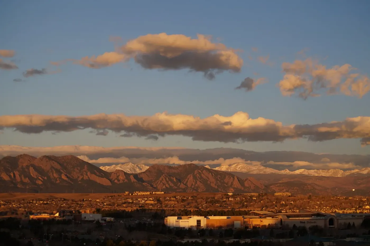 Sunlit Flatirons and Front Range mountains viewed from Broomfield, Colorado