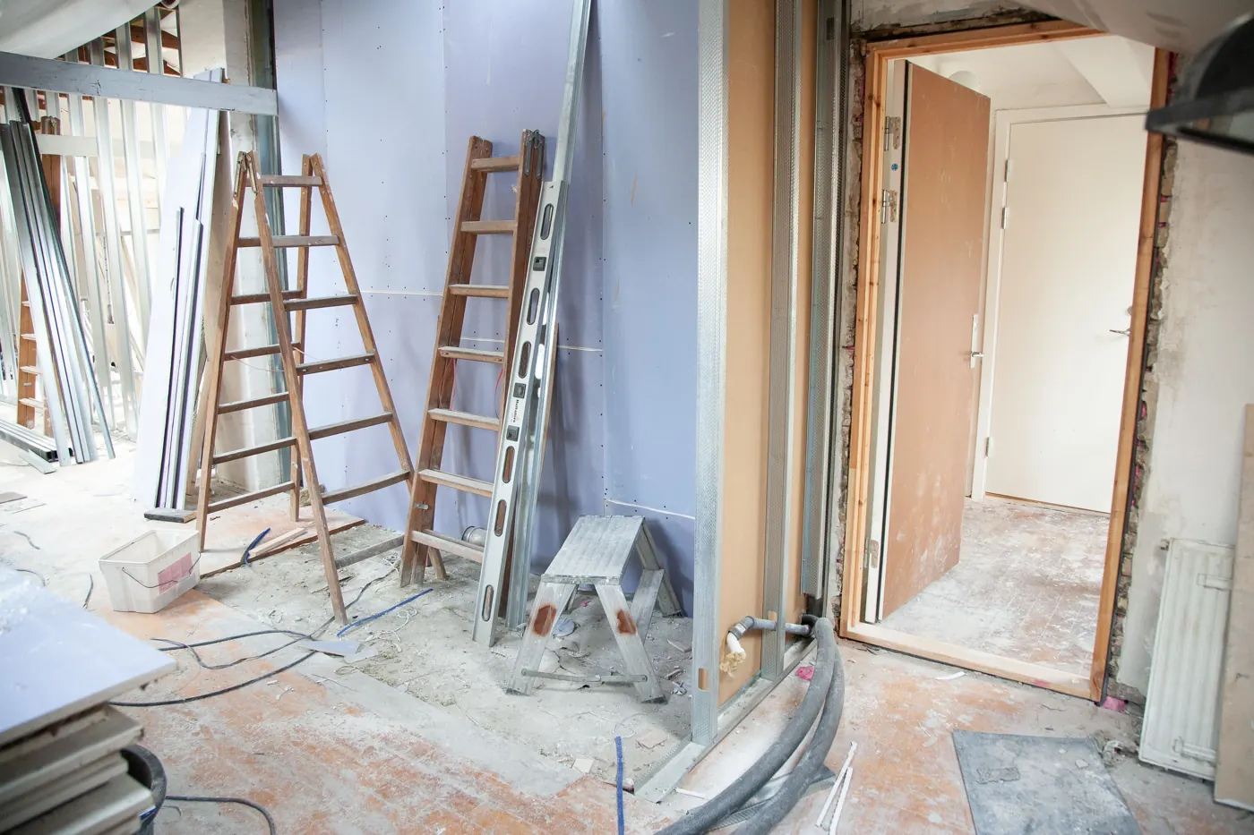 Ladders, tools and building materials during a home renovation ladders, tools and building materials during a home renovation