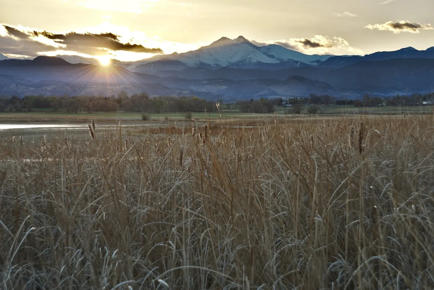 Sunset and Front Range mountains near McIntosh Lake in Longmont, Colorado