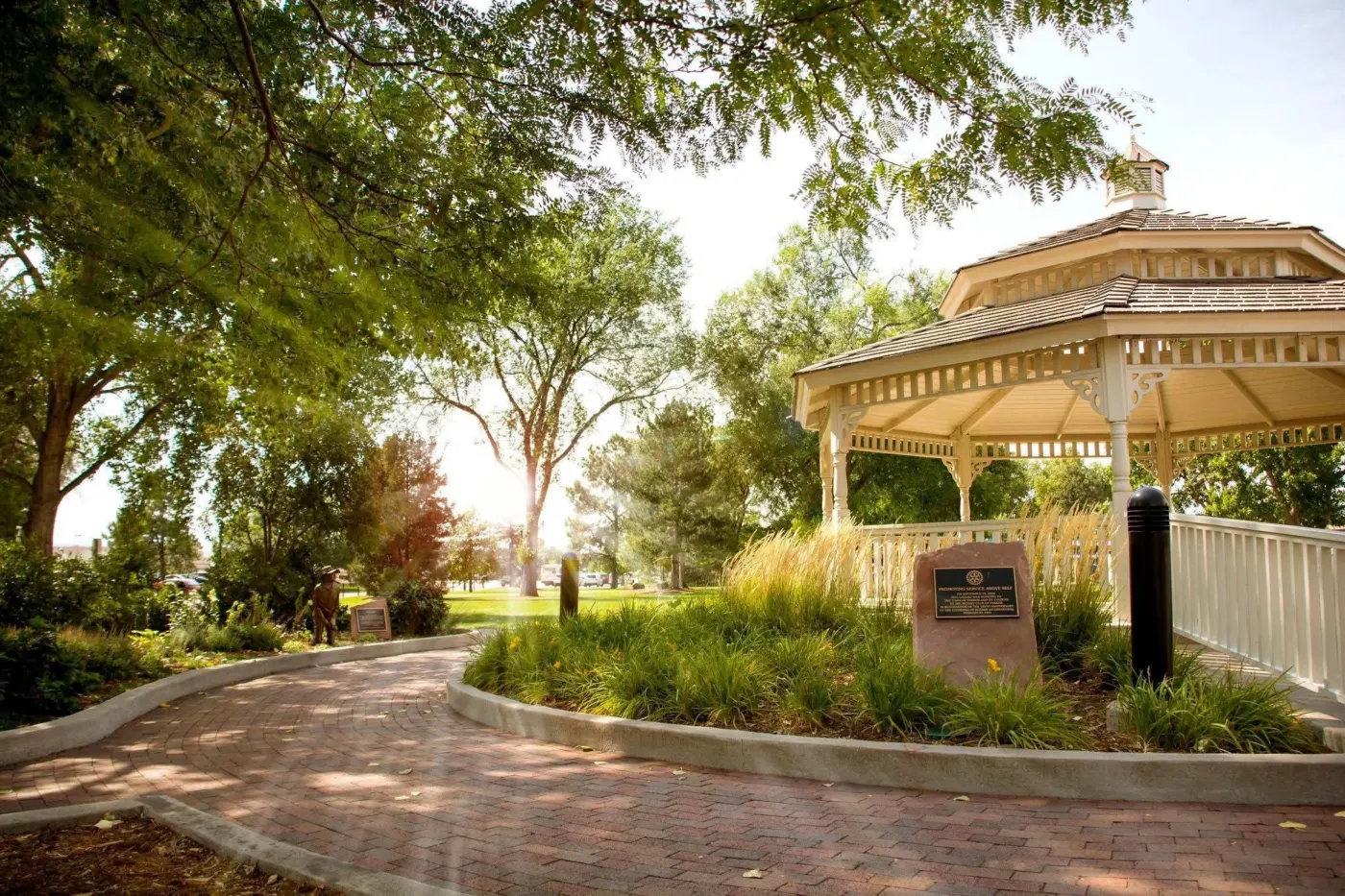 A shaded pavilion surrounded by trees along Mainstreet in Parker, Colorado.