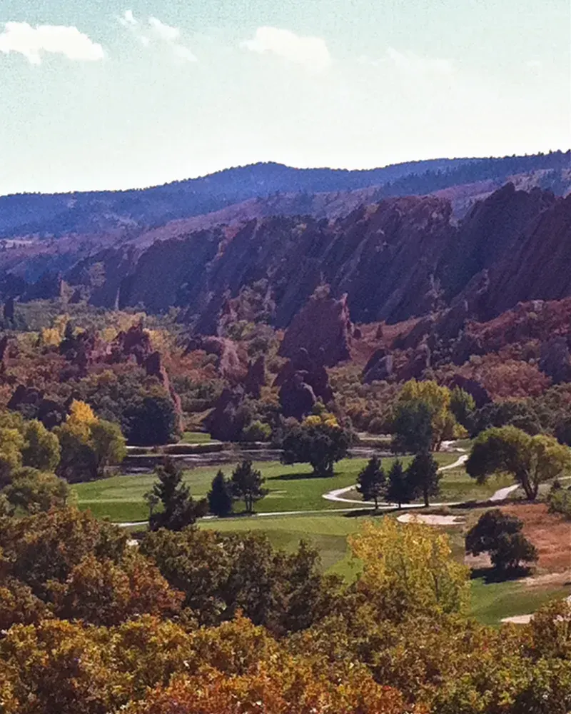 Wooded valley and red rock ridges in the Roxborough Park area