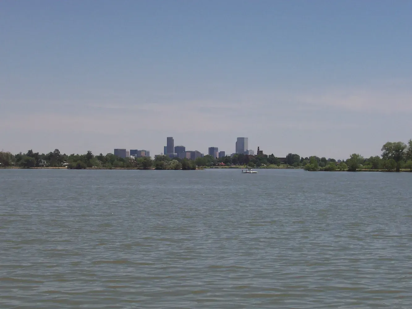 Denver skyline seen across Sloan’s Lake